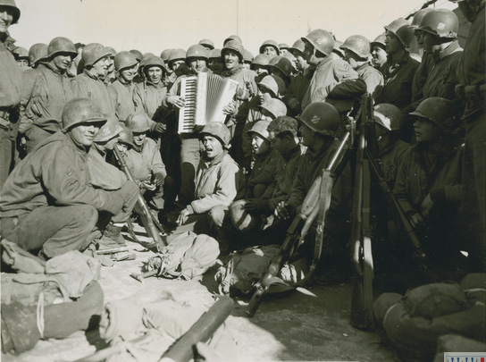 Chaplain Leading a Group in Singing