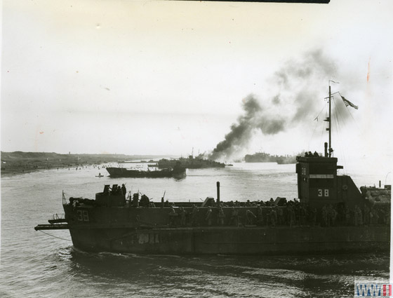 US Troops and Landing Ships on Beach