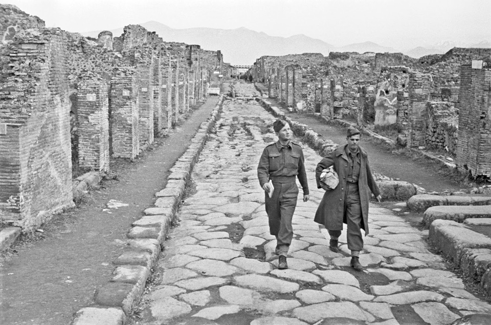 Two New Zealanders walk down