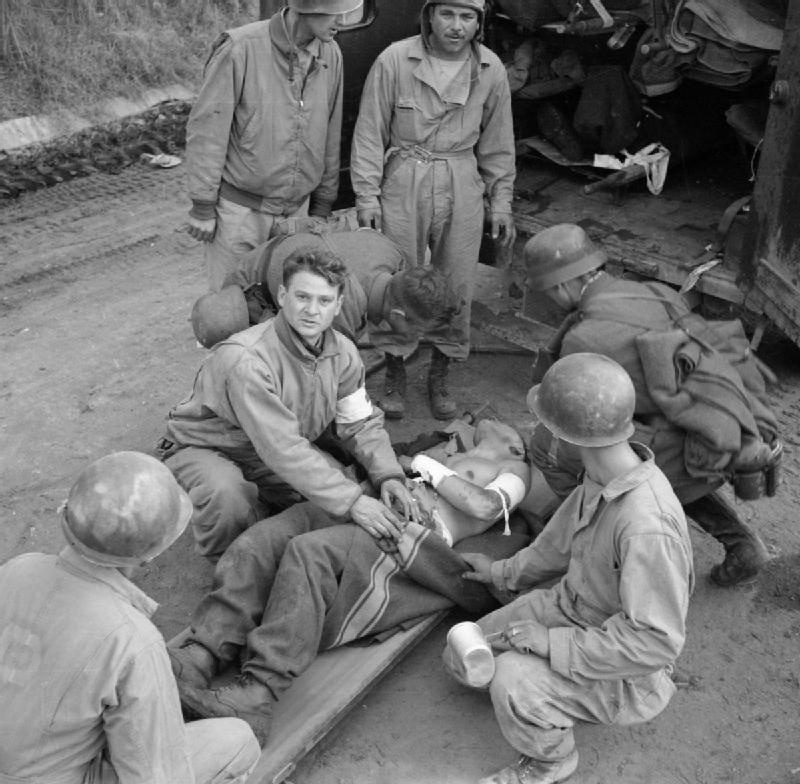 Medics Attend to a Wounded German Soldier