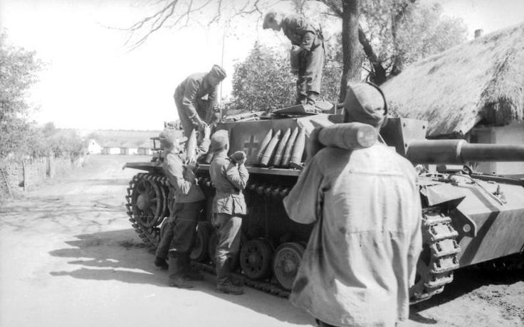 Exhausted German Soldiers with a Tiger 1