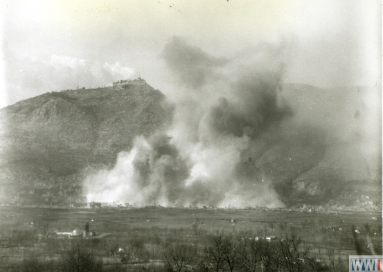 smoke rises over Cassino