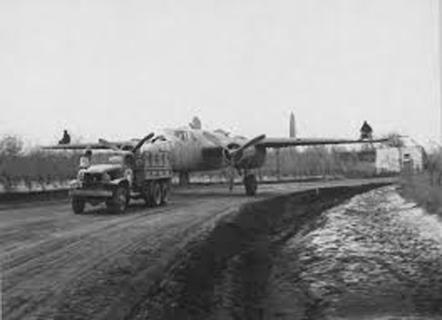 Truck Towing a B-25