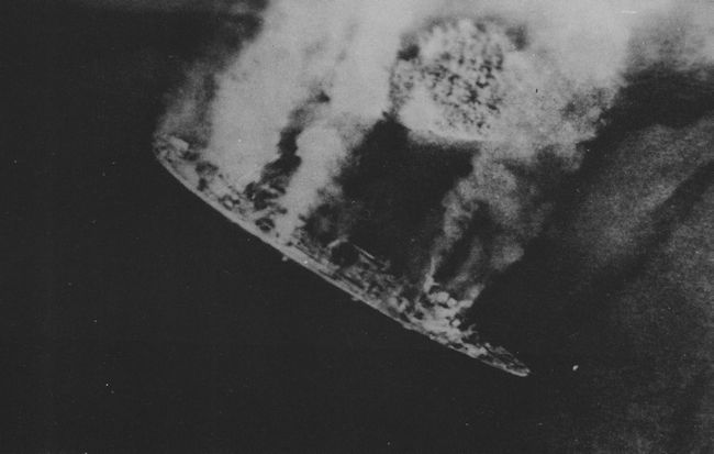 Repair ship <i>Akashi</i> burning