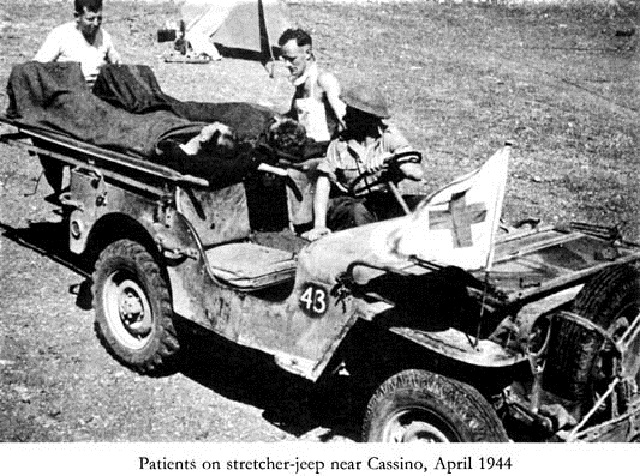 Patients on stretcher-jeep near Cassino