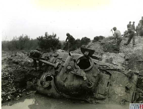 US tank trapped in bomb crater