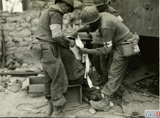 US soldier Is Bandaged in Santa Maria Infante