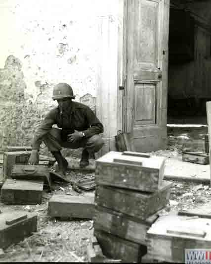 Soldier Inspects German Mines