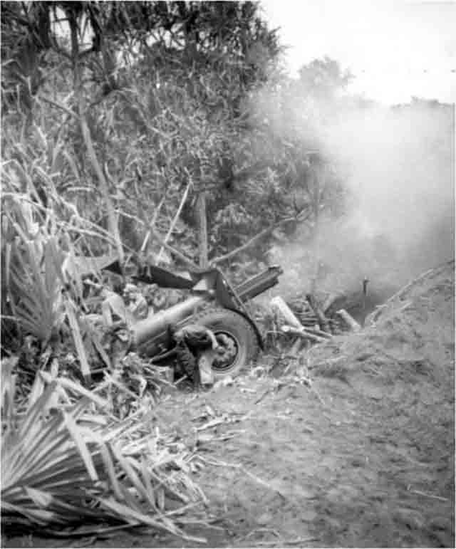 155-mm Howtizer M1918 Firing on Japanese Positions