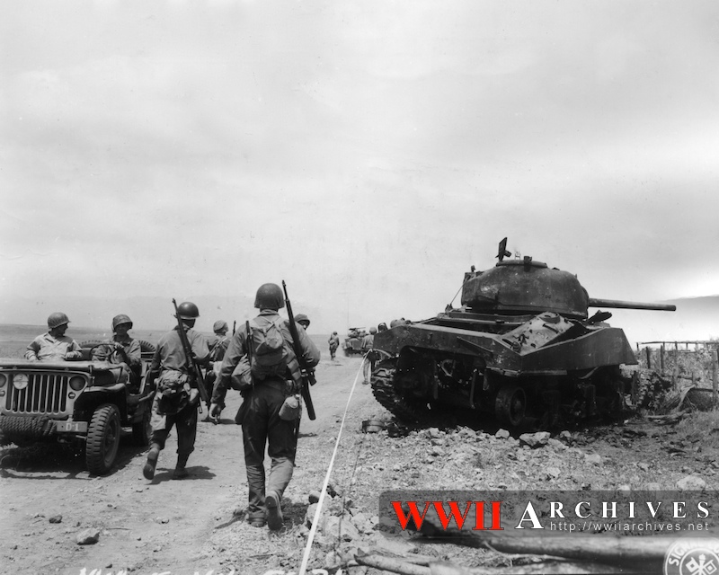 Passing a Knocked Out American Tank