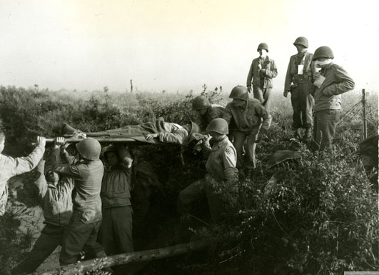 Wounded US Soldier Being Carried on Litter