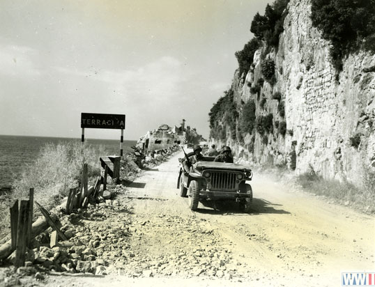 US Jeep Driving Out of Terracina