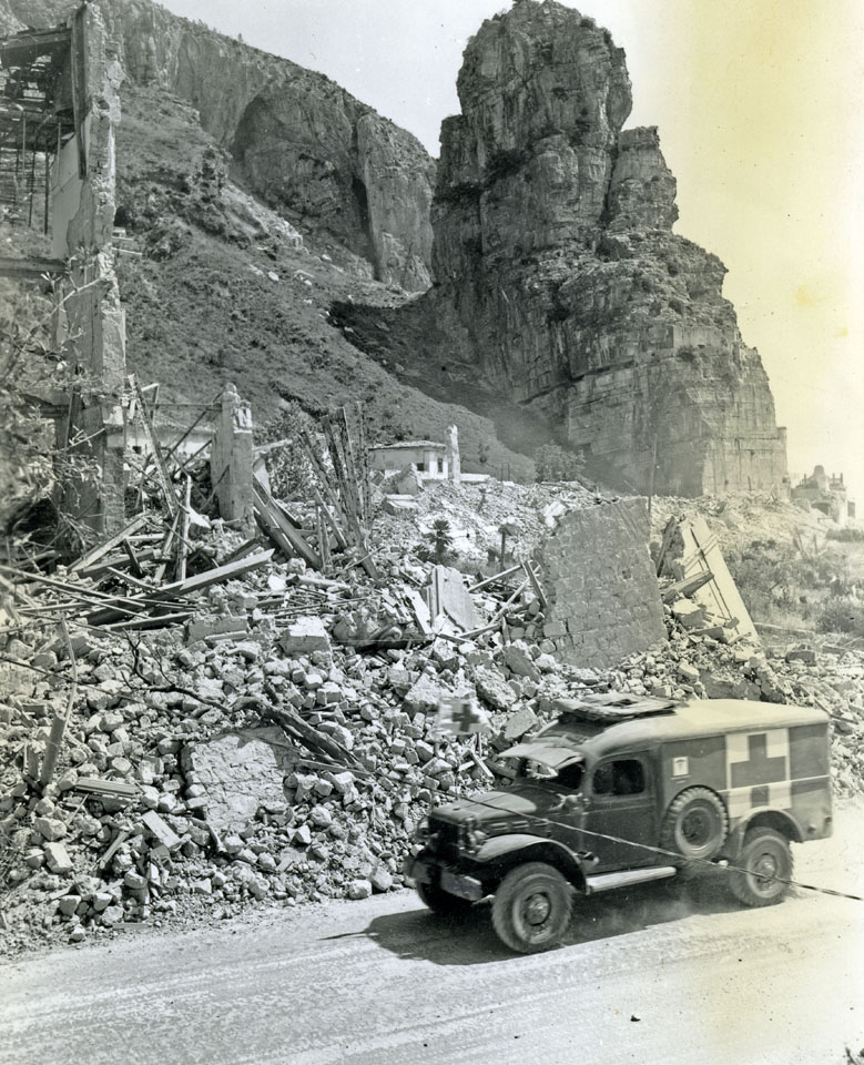 An Ambulance Moves Past a Destroyed German Fortress