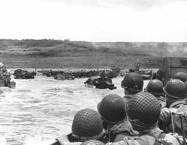 Soldiers Crowd a Landing Craft