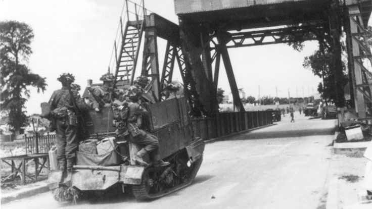 Universal Carrier crosses Bnouville Bridge