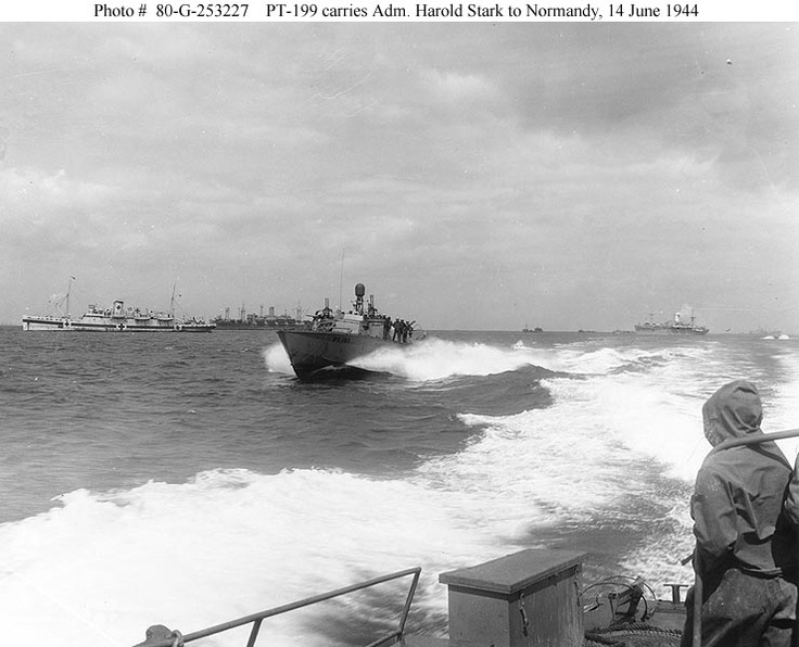 USS PT-199 speeds past invasion shipping