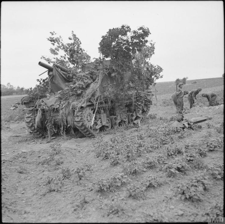 Camouflaged Priest 105mm self-propelled gun