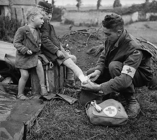 Bandaging the Burnt Leg of a French Boy