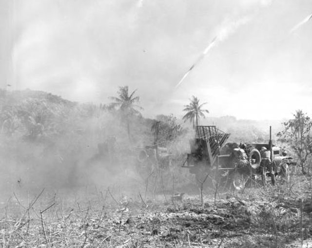 Firing Rockets at Japanese Positions