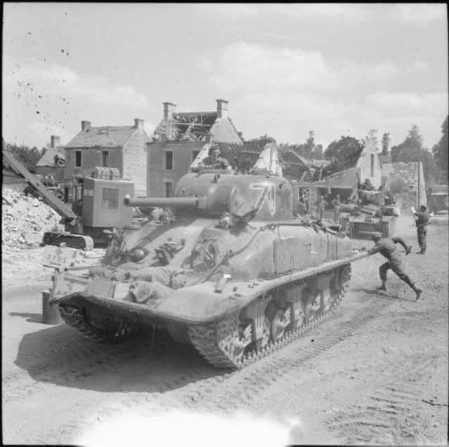 Sherman DD tank Passing Through Douet