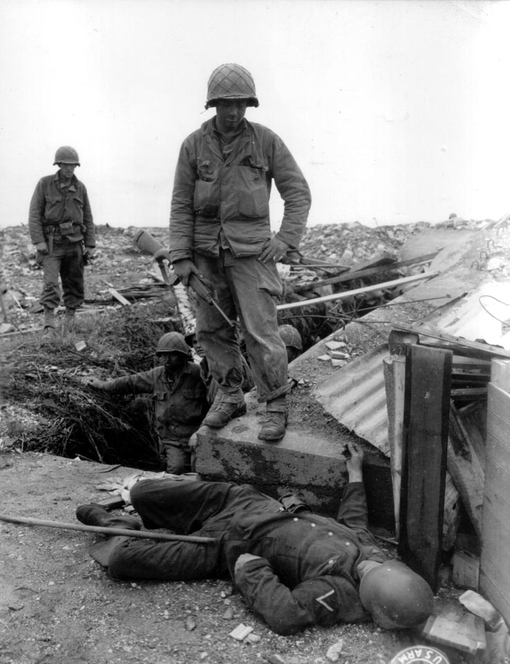 US Troops Look on at a Fallen <i>Wehrmacht</i> Soldier