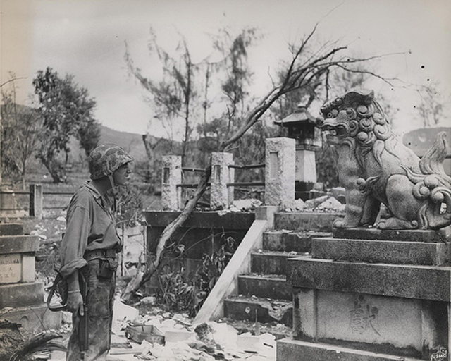 A Marine Pauses in a Japanese Shrine Garden