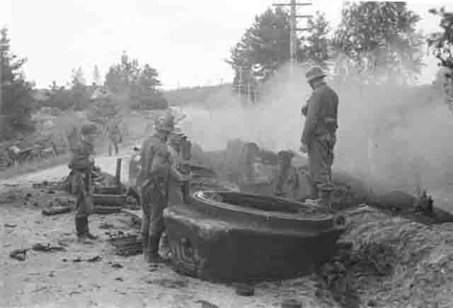 Examining a Destroyed Soviet T-34