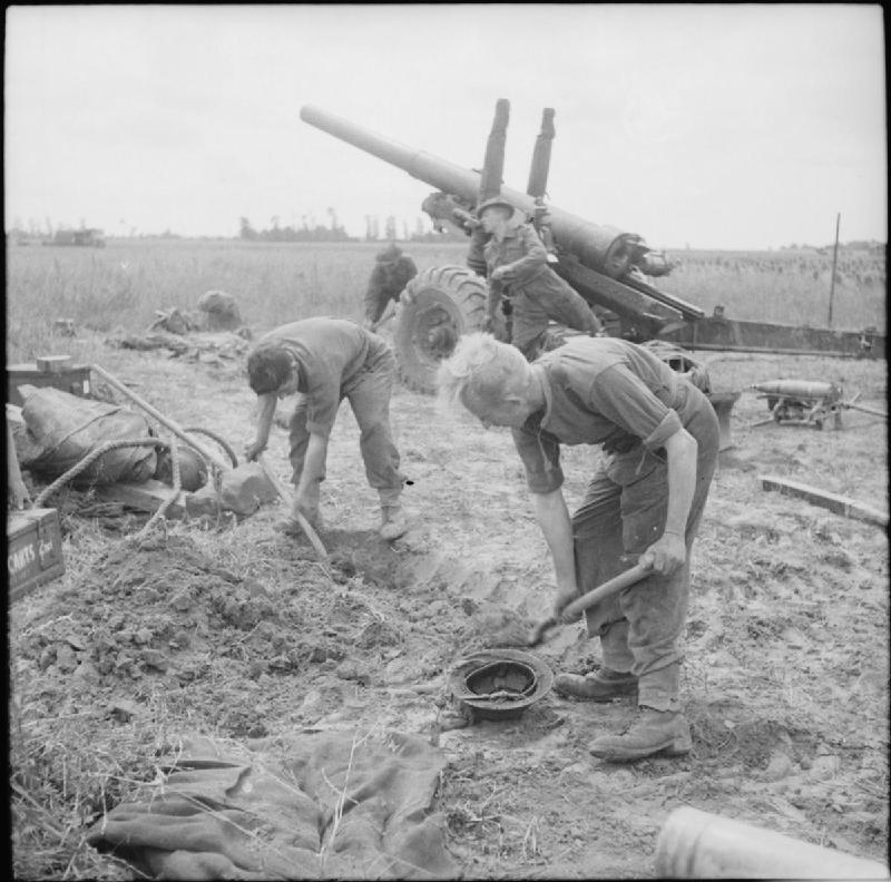 5.5-inch gun crew digging in