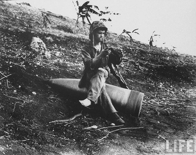 Resting on a 16-inch Naval Shell