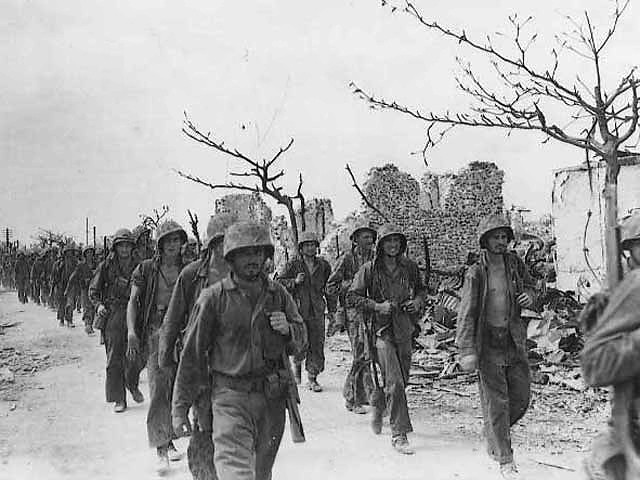 Marines March Through Garapan