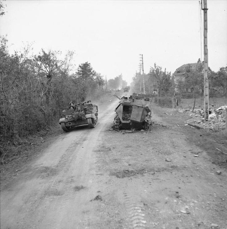 Passing a Burnt-out German Half-track