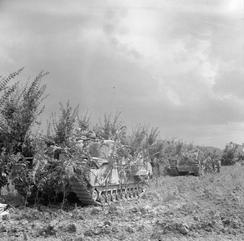 Camouflaged Churchill tanks