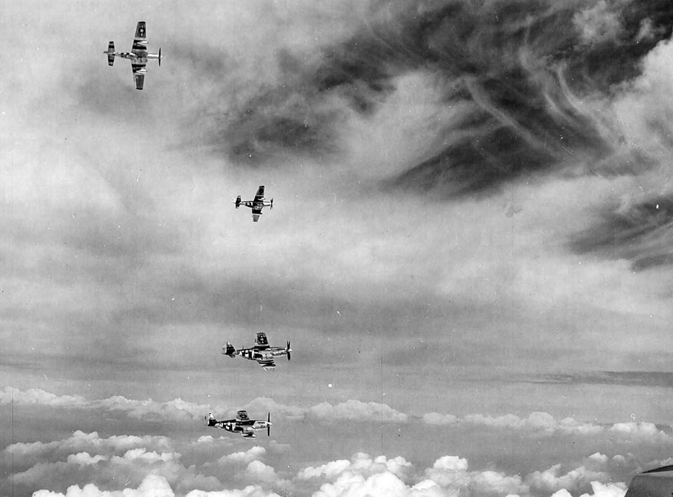 P-51s Fly Above The Clouds