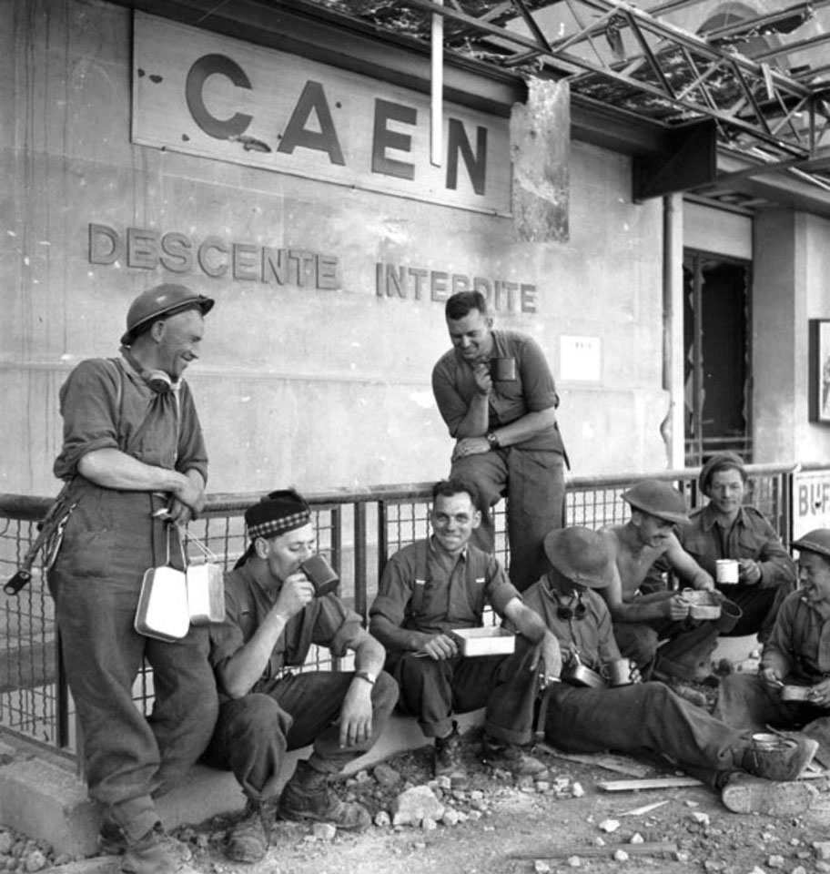 Canadian Infantrymen Outside Railroad Station