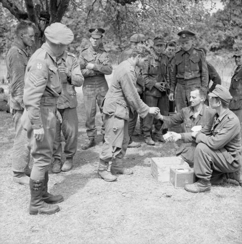 German prisoners being issued with rations