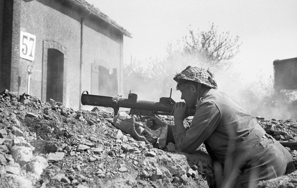 A soldier fires a PIAT