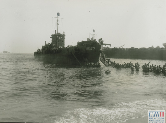 German prisoners board US landing craft