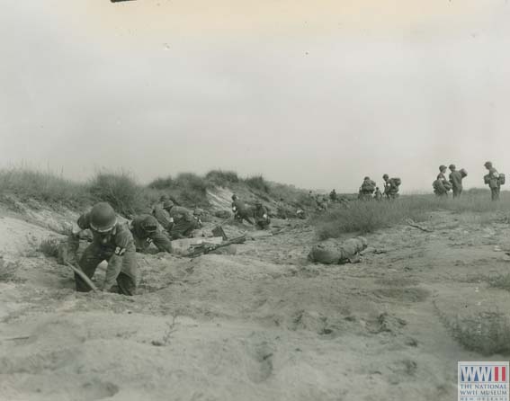 US soldiers digging foxholes