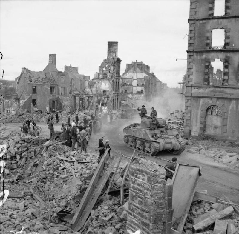  A Sherman Drives through the Remains of Flers