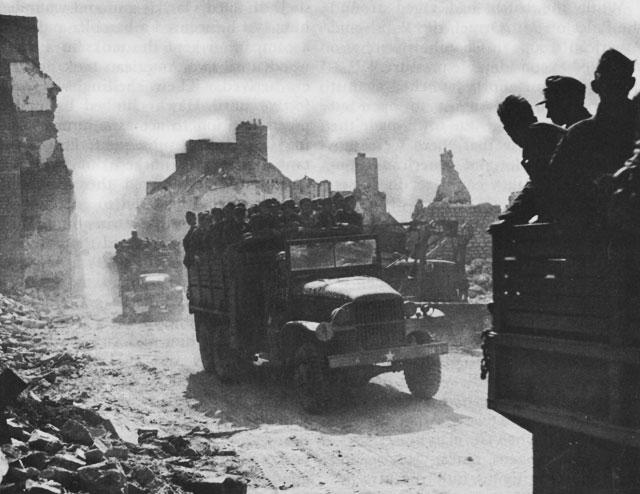 Trucks Carry German POWs