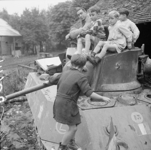 Climbing a Free French M3A3 Stuart Tank