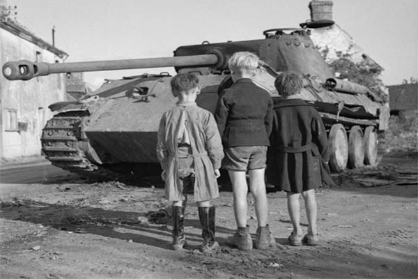 Looking at a Knocked-out German Tank