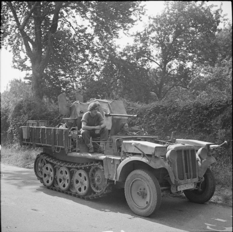 6th Airborne Soldiers Aboard a Captured German Half-track