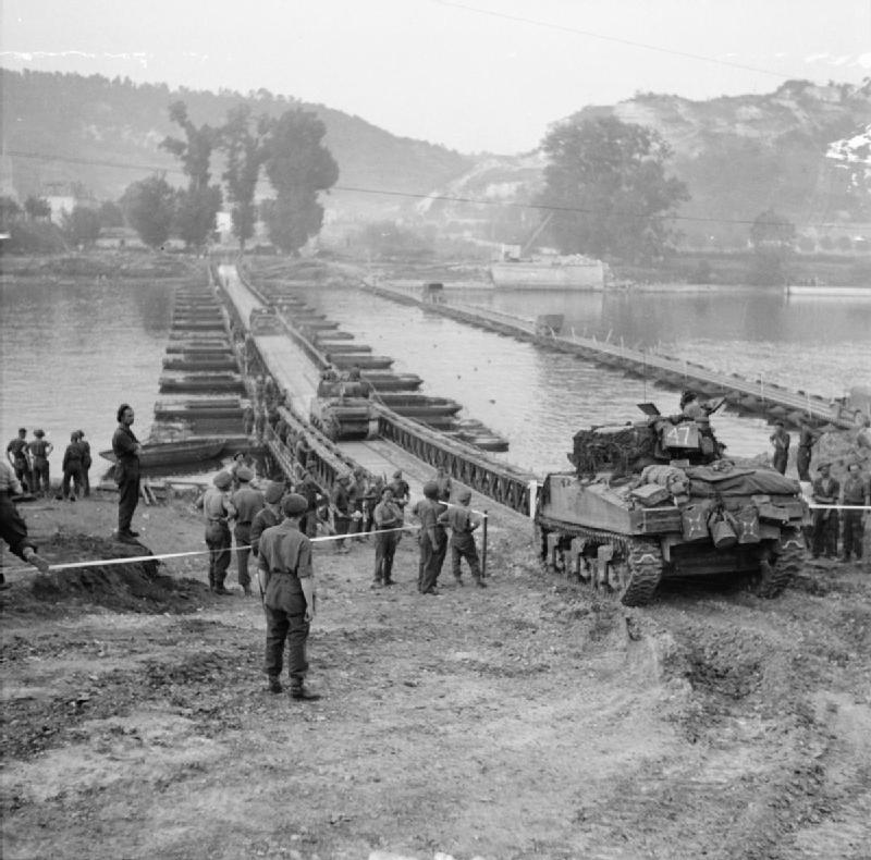 Sherman Tanks Crossing a Pontoon Bridge