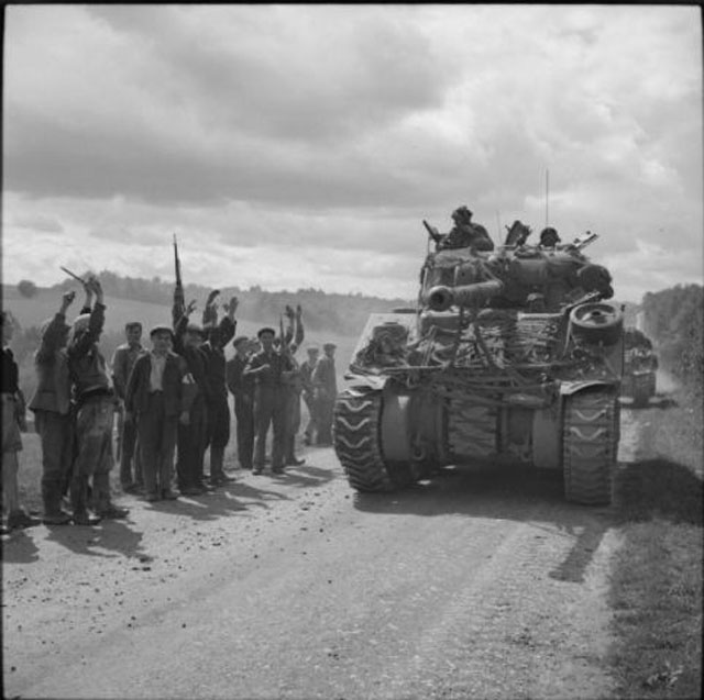 FFI cheer as a Sherman Firefly