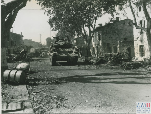 US tank passes destroyed German convoy