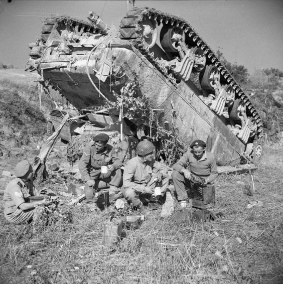 Having Tea Beside Upended Tank