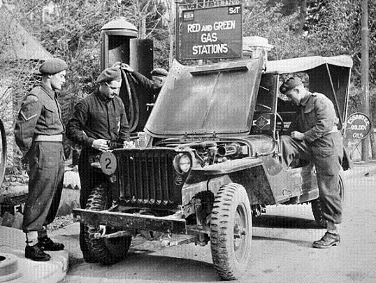 Canadians Filling a Jeep with Gasoline