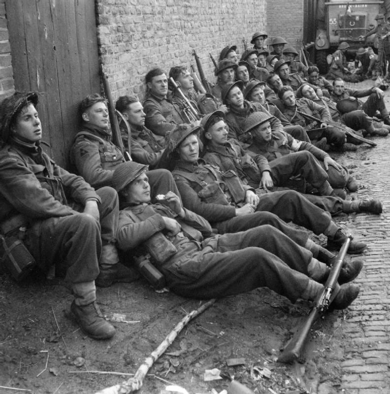 Men of the Royal Warwickshire Regiment rest