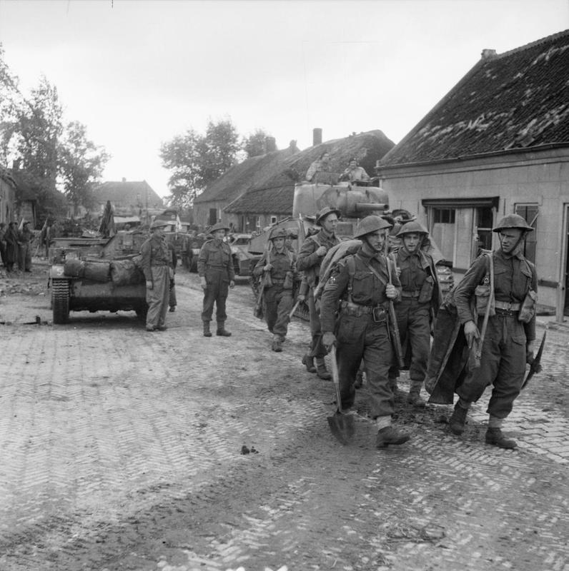 Sherman tanks and infantry of 8 Corps